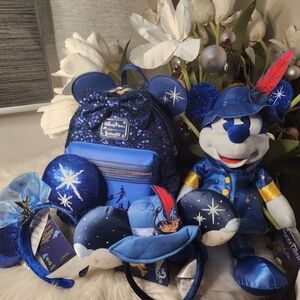 Set of 4 Peter Pan Backpack 2pairs of ears& PlushAll of them brand new